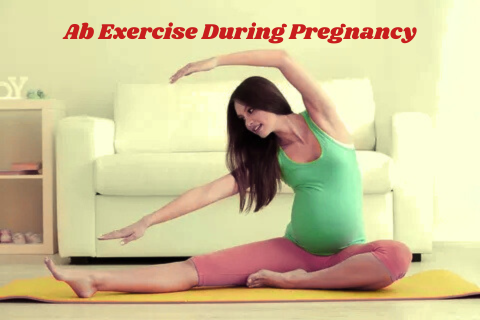 Pregnant woman doing safe ab exercise on a yoga mat at home.